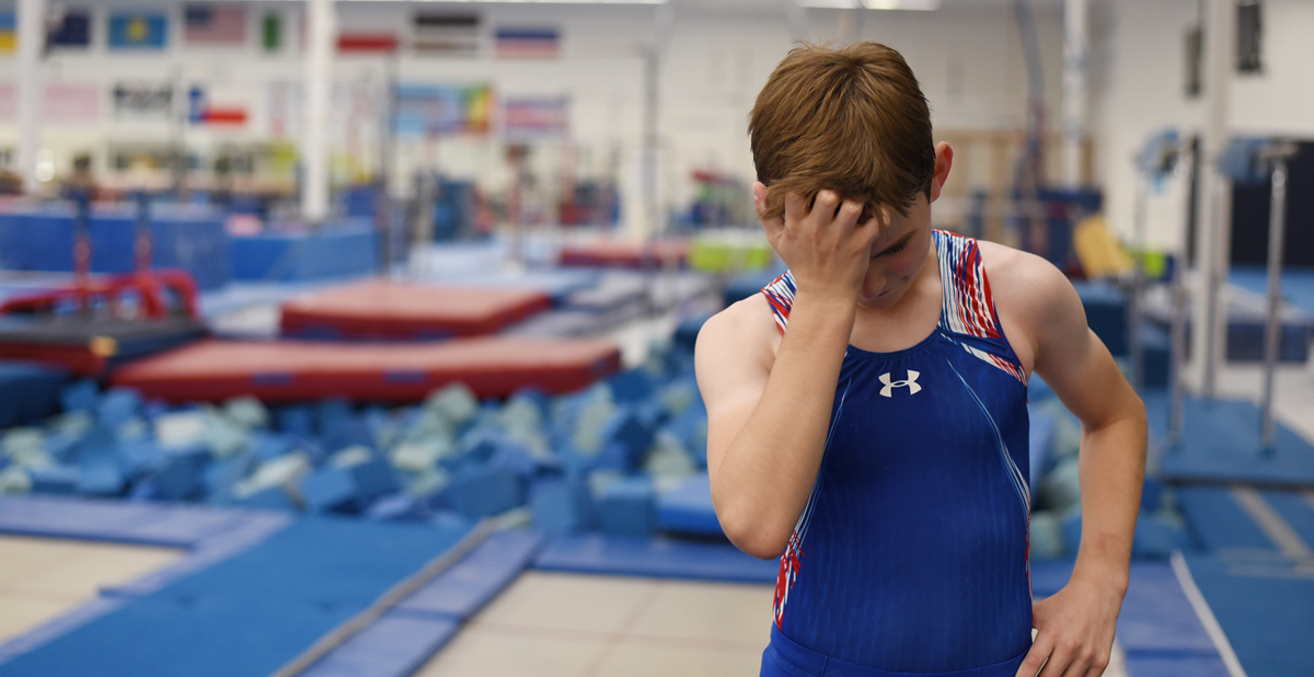 Male Gymnast on trampoline