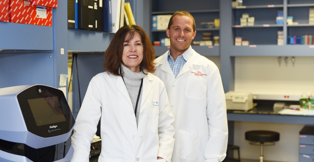 Johnathan Rio's and Carol Wise in research lab