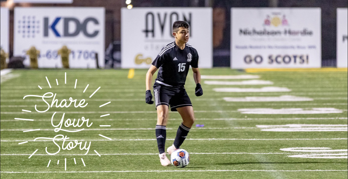 Anthony playing soccer