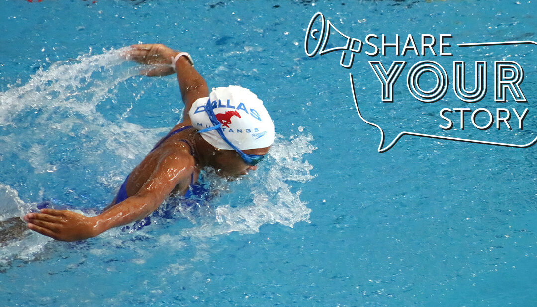 a girl swimming in a swimming pool