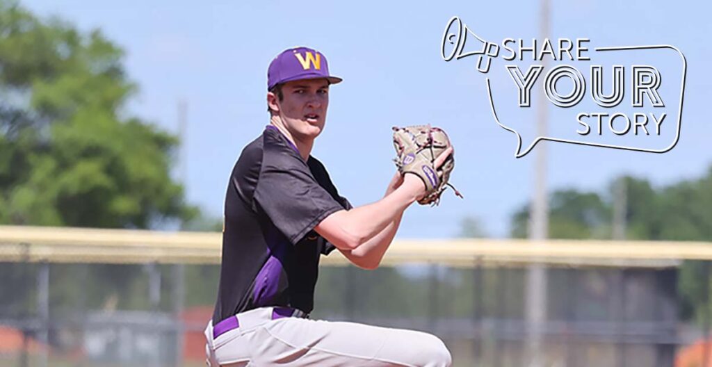 boy on baseball field pitching