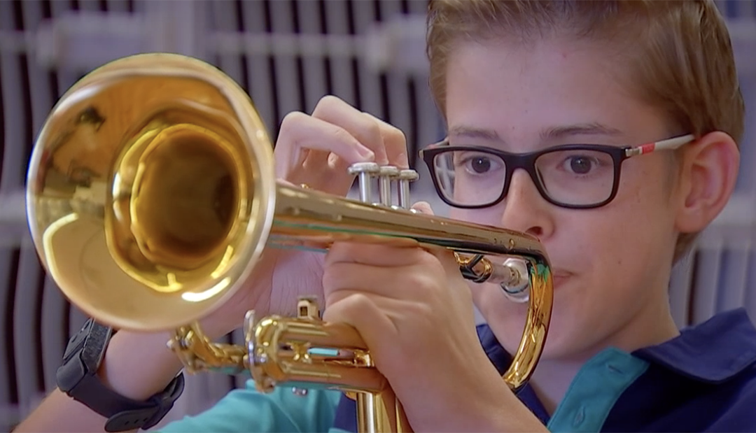 boy with band instrument